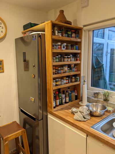 Spice rack shelving in kitchen