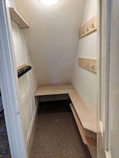 Shelving fitted inside wardrobe with divider