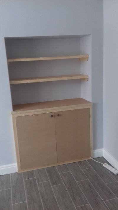 Alcove cupboard with shelves above